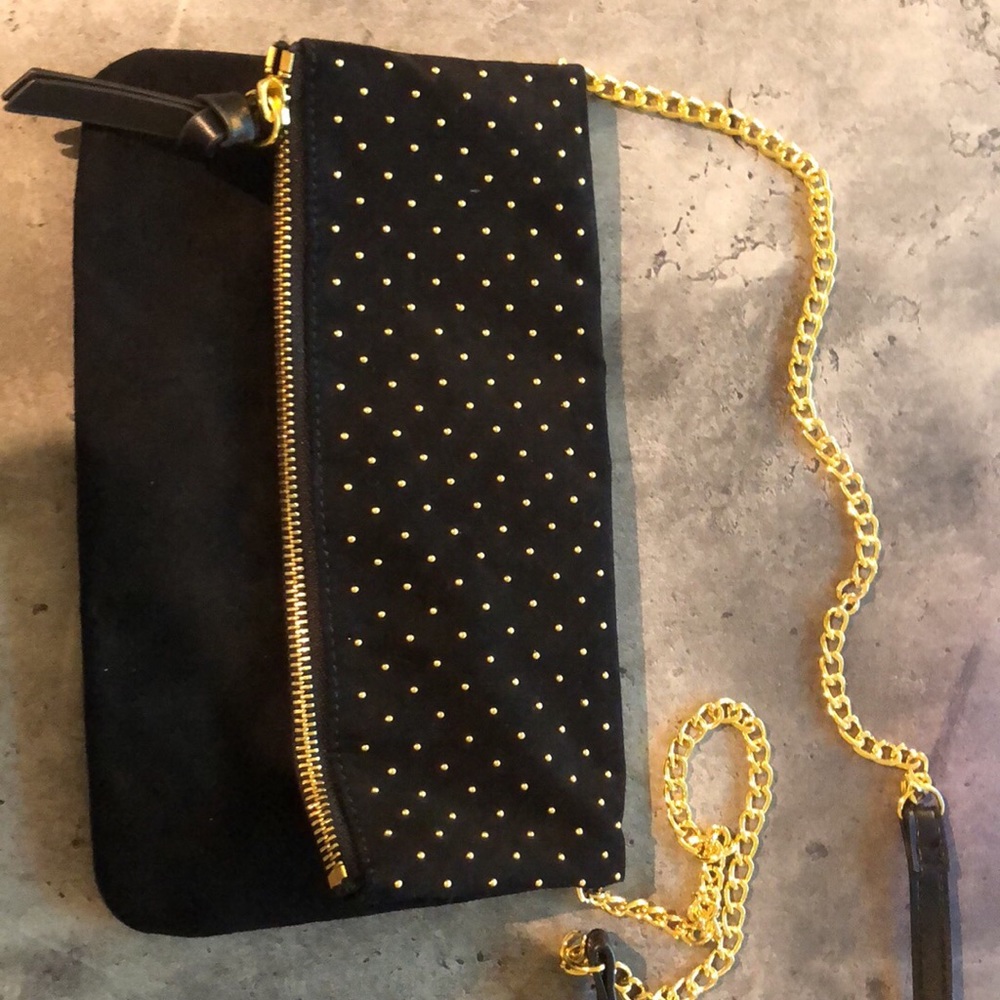 Black cross body bag with gold accents